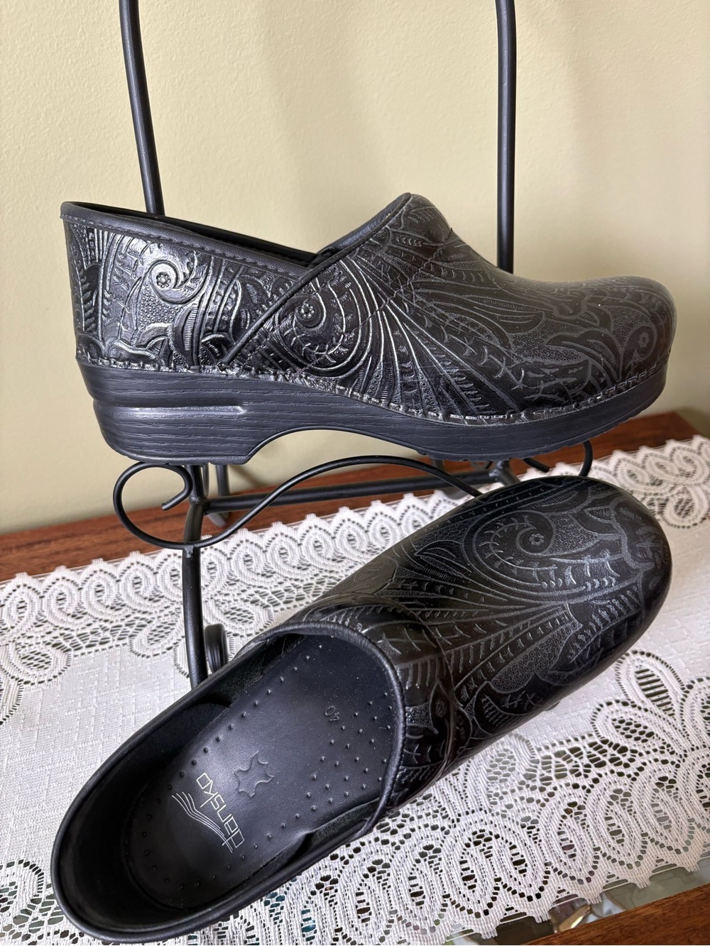 Dansko Black Embossed Leather Clogs with Decorative Pattern